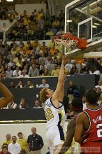 Luke Schenscher takes a shot against UGA.  Men's Basketball Georgia Tech beat UGA 87-49.

Filename: crw_5922_std.jpg
Aperture: f/2.8
Shutter Speed: 1/640
Body: Canon EOS DIGITAL REBEL
Lens: Canon EF 80-200mm f/2.8 L