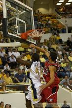 Ra'Sean Dickey goes for the layup against UGA.  Men's Basketball Georgia Tech beat UGA 87-49.

Filename: crw_6039_std.jpg
Aperture: f/2.8
Shutter Speed: 1/640
Body: Canon EOS DIGITAL REBEL
Lens: Canon EF 80-200mm f/2.8 L