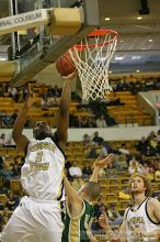 Isma'il Muhammad shoots a layup at the men's basketball game vs LeMoyne.                                                                                                                                                                                       

Filename: img_4078_std.jpg
Aperture: f/2.8
Shutter Speed: 1/500
Body: Canon EOS DIGITAL REBEL
Lens: Canon EF 80-200mm f/2.8 L