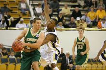 Mario West plays defense on LeMoyne at the men's basketball game.                                                                                                                                                                                              

Filename: img_4084_std.jpg
Aperture: f/2.8
Shutter Speed: 1/500
Body: Canon EOS DIGITAL REBEL
Lens: Canon EF 80-200mm f/2.8 L