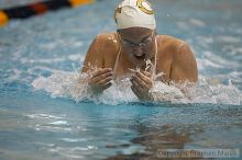 Laura Heiser placed 5th in the women's 100 yd breaststroke against UVA

Filename: crw_3793_std.jpg
Aperture: f/2.8
Shutter Speed: 1/500
Body: Canon EOS DIGITAL REBEL
Lens: Canon EF 80-200mm f/2.8 L