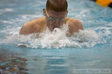 Alex Williams competed in the men's 100 yd breaststroke against UVA

Filename: crw_3801_std.jpg
Aperture: f/2.8
Shutter Speed: 1/500
Body: Canon EOS DIGITAL REBEL
Lens: Canon EF 80-200mm f/2.8 L