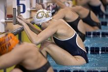 Jaclyn Kets placed 6th in the 100m backstroke against FSU, UMD and VT

Filename: crw_2950_std.jpg
Aperture: f/2.8
Shutter Speed: 1/500
Body: Canon EOS DIGITAL REBEL
Lens: Canon EF 80-200mm f/2.8 L