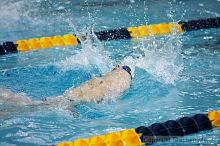 Jeremy Raines competes against the University of Tennessee in the backstroke.

Filename: crw_2222_std.jpg
Aperture: f/2.8
Shutter Speed: 1/640
Body: Canon EOS DIGITAL REBEL
Lens: Canon EF 80-200mm f/2.8 L