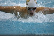 Onur Uras of GT competes in the butterfly against the University of Tennessee.

Filename: crw_2208_std.jpg
Aperture: f/2.8
Shutter Speed: 1/640
Body: Canon EOS DIGITAL REBEL
Lens: Canon EF 80-200mm f/2.8 L