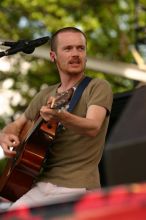 Damien Rice performs on the 99X stage on the second day of Music Midtown, 2004.

Filename: IMG_6339.jpg
Aperture: f/4.5
Shutter Speed: 1/320
Body: Canon EOS DIGITAL REBEL
Lens: Canon EF 80-200mm f/2.8 L