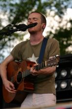 Damien Rice performs on the 99X stage on the second day of Music Midtown, 2004.

Filename: IMG_6322.jpg
Aperture: f/5.0
Shutter Speed: 1/320
Body: Canon EOS DIGITAL REBEL
Lens: Canon EF 80-200mm f/2.8 L