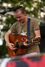 Damien Rice performs on the 99X stage on the second day of Music Midtown, 2004.

Filename: IMG_6327.jpg
Aperture: f/3.5
Shutter Speed: 1/320
Body: Canon EOS DIGITAL REBEL
Lens: Canon EF 80-200mm f/2.8 L