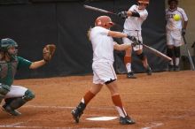 #4, MicKayla Padilla, bats against the Mean Green.  The Lady Longhorns beat the University of North Texas 5-0 in the first game of the double header Wednesday night.

Filename: SRM_20060308_210223_8.jpg
Aperture: f/2.8
Shutter Speed: 1/1600
Body: Canon EOS 20D
Lens: Canon EF 80-200mm f/2.8 L