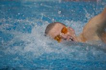 Scott Drews of the University of Texas Men's Varsity Swim Team placed 5th in the 1st heat of the 1650 Freestyle with a time of 15:38.65 at the Speedo American Short Course Championships.

Filename: SRM_20060304_185122_9.jpg
Aperture: f/2.8
Shutter Speed: 1/1000
Body: Canon EOS 20D
Lens: Canon EF 80-200mm f/2.8 L