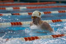 Matthew Lowe of the University of Texas Men's Varsity Swim Team placed 6th in the last heat of the 200 IM Finals with a time of 1:50.02 at the Speedo American Short Course Championships.

Filename: SRM_20060304_192324_5.jpg
Aperture: f/3.5
Shutter Speed: 1/800
Body: Canon EOS 20D
Lens: Canon EF 80-200mm f/2.8 L