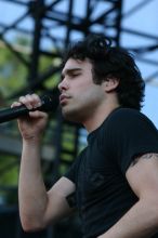 Trapt performs on the 99X stage on the second day of Music Midtown, 2004.

Filename: IMG_6534.jpg
Aperture: f/6.3
Shutter Speed: 1/320
Body: Canon EOS DIGITAL REBEL
Lens: Canon EF 80-200mm f/2.8 L