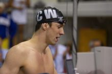 Michael Phelps of the University of Michigan Swim Team placed 1st in the last heat of the 200 IM Finals with a record time of 1:41.30, beating the old record of 1:41.71 at the Speedo American Short Course Championships.

Filename: SRM_20060304_192614_4.jpg
Aperture: f/2.8
Shutter Speed: 1/640
Body: Canon EOS 20D
Lens: Canon EF 80-200mm f/2.8 L