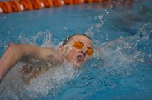 Scott Drews of the University of Texas Men's Varsity Swim Team placed 5th in the 1st heat of the 1650 Freestyle Finals with a time of 15:38.65 at the Speedo American Short Course Championships.

Filename: SRM_20060304_185246_5.jpg
Aperture: f/2.8
Shutter Speed: 1/1000
Body: Canon EOS 20D
Lens: Canon EF 80-200mm f/2.8 L