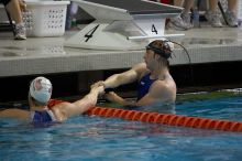 Ian Crocker of the Longhorn Aquatic swim team, ex-member of the University of Texas Men's Varsity Swim Team, placed 1st in the last heat of the 100 Freestyle Finals with a time of 41.83 at the Speedo American Short Course Championships.

Filename: SRM_20060304_182724_1.jpg
Aperture: f/2.8
Shutter Speed: 1/640
Body: Canon EOS 20D
Lens: Canon EF 80-200mm f/2.8 L