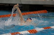 Garrett Weber Gale (Black Goggles) and Chris Seitz (Blue goggles) of the University of Texas Men's Varsity Swim Team placed 7th and 8th in the 6th heat of the 200 Backstroke Prelims with a time of 1:45.69 and 1:46.00 at the Speedo American Short Course Championships.

Filename: SRM_20060304_181422_1.jpg
Aperture: f/3.5
Shutter Speed: 1/640
Body: Canon EOS 20D
Lens: Canon EF 80-200mm f/2.8 L