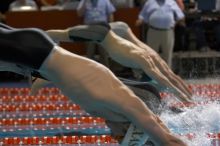 Matthew Lowe of the University of Texas Men's Varsity Swim Team placed 6th in the last heat of the 200 IM Finals with a time of 1:50.02 at the Speedo American Short Course Championships.

Filename: SRM_20060304_192202_6.jpg
Aperture: f/3.5
Shutter Speed: 1/800
Body: Canon EOS 20D
Lens: Canon EF 80-200mm f/2.8 L