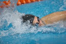 Kelsey Ditto of the Longhorn Aquatic swim team placed 1st in the last heat of the 1650 Freestyle Finals with a time of 16:05.39 at the Speedo American Short Course Championships.

Filename: SRM_20060304_183538_7.jpg
Aperture: f/2.8
Shutter Speed: 1/1000
Body: Canon EOS 20D
Lens: Canon EF 80-200mm f/2.8 L