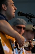 The Gene Pool, performing at the Austin airport.  Geno Stroia II on vocals/guitar, Jorge Castillo on vocals/guitar, Travis Woodard on drums and Steven Ray Will on vocals/bass guitar.

Filename: SRM_20060518_155442_8.jpg
Aperture: f/2.8
Shutter Speed: 1/250
Body: Canon EOS 20D
Lens: Canon EF 80-200mm f/2.8 L