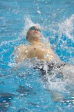 Tromp Trompeter of the University of Texas Men's Varsity Swim Team placed 1st in the 5th heat of the 200 Backstroke Prelims with a time of 1:47:46 at the Speedo American Short Course Championships.

Filename: SRM_20060304_181120_2.jpg
Aperture: f/3.5
Shutter Speed: 1/640
Body: Canon EOS 20D
Lens: Canon EF 80-200mm f/2.8 L