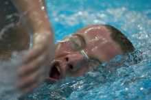 Blake Copple of the University of Texas Men's Varsity Swim Team placed 2nd in the 3rd heat of the 1650 Freestyle Prelims with a time of 15:57.48 at the Speedo American Short Course Championships.

Filename: SRM_20060304_114344_1.jpg
Aperture: f/2.8
Shutter Speed: 1/1000
Body: Canon EOS 20D
Lens: Canon EF 80-200mm f/2.8 L