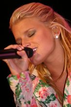 Jessica Simpson performs on the third day of Music Midtown, 2004.

Filename: IMG_7328.jpg
Aperture: f/2.8
Shutter Speed: 1/250
Body: Canon EOS DIGITAL REBEL
Lens: Canon EF 80-200mm f/2.8 L
