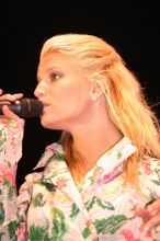 Jessica Simpson performs on the third day of Music Midtown, 2004.

Filename: IMG_7308.jpg
Aperture: f/2.8
Shutter Speed: 1/250
Body: Canon EOS DIGITAL REBEL
Lens: Canon EF 80-200mm f/2.8 L
