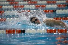 Kelsey Ditto of the Longhorn Aquatic swim team placed 1st in the last heat of the 1650 Freestyle Finals with a time of 16:05.39 at the Speedo American Short Course Championships.

Filename: SRM_20060304_183330_5.jpg
Aperture: f/2.8
Shutter Speed: 1/1250
Body: Canon EOS 20D
Lens: Canon EF 80-200mm f/2.8 L