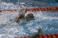 Tanica Jamison of the Longhorn Aquatic swim team, ex-member of the University of Texas swim team, placed 2nd in the last heat of the 100 Freestyle Finals with a time of 49.33 at the Speedo American Short Course Championships.

Filename: SRM_20060304_182116_1.jpg
Aperture: f/3.5
Shutter Speed: 1/640
Body: Canon EOS 20D
Lens: Canon EF 80-200mm f/2.8 L