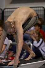 Scott Drews of the University of Texas Men's Varsity Swim Team placed 5th in the 1st heat of the 1650 Freestyle with a time of 15:38.65 at the Speedo American Short Course Championships.

Filename: SRM_20060304_185050_1.jpg
Aperture: f/2.8
Shutter Speed: 1/1000
Body: Canon EOS 20D
Lens: Canon EF 80-200mm f/2.8 L