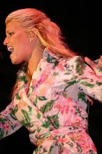 Jessica Simpson performs on the third day of Music Midtown, 2004.

Filename: IMG_7246.jpg
Aperture: f/2.8
Shutter Speed: 1/250
Body: Canon EOS DIGITAL REBEL
Lens: Canon EF 80-200mm f/2.8 L