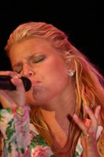 Jessica Simpson performs on the third day of Music Midtown, 2004.

Filename: IMG_7333.jpg
Aperture: f/2.8
Shutter Speed: 1/250
Body: Canon EOS DIGITAL REBEL
Lens: Canon EF 80-200mm f/2.8 L