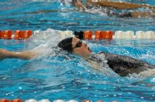 Mary Beck of the Longhorn Aquatic swim team placed 7th overall in the 200 IM Prelims with a time of 2:02.47 at the Speedo American Short Course Championships.

Filename: SRM_20060304_112136_8.jpg
Aperture: f/4.0
Shutter Speed: 1/320
Body: Canon EOS 20D
Lens: Canon EF 80-200mm f/2.8 L