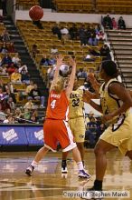 The Georgia Tech women's basketball team played Clemson.

Filename: img_0616_std.jpg
Aperture: f/2.8
Shutter Speed: 1/320
Body: Canon EOS DIGITAL REBEL
Lens: Canon EF 80-200mm f/2.8 L
