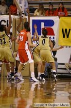 The Georgia Tech women's basketball team played Clemson.

Filename: img_0614_std.jpg
Aperture: f/2.8
Shutter Speed: 1/320
Body: Canon EOS DIGITAL REBEL
Lens: Canon EF 80-200mm f/2.8 L