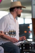 The Gene Pool, performing at the Austin airport.  Geno Stroia II on vocals/guitar, Jorge Castillo on vocals/guitar, Travis Woodard on drums and Steven Ray Will on vocals/bass guitar.

Filename: SRM_20060518_154942_9.jpg
Aperture: f/4.5
Shutter Speed: 1/200
Body: Canon EOS 20D
Lens: Canon EF 80-200mm f/2.8 L