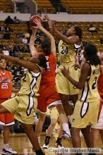 The Georgia Tech women's basketball team played Clemson.

Filename: img_0586_std.jpg
Aperture: f/2.8
Shutter Speed: 1/320
Body: Canon EOS DIGITAL REBEL
Lens: Canon EF 80-200mm f/2.8 L