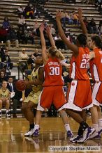 The Georgia Tech women's basketball team played Clemson.

Filename: img_0645_std.jpg
Aperture: f/2.8
Shutter Speed: 1/320
Body: Canon EOS DIGITAL REBEL
Lens: Canon EF 80-200mm f/2.8 L