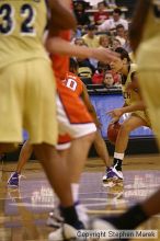 The Georgia Tech women's basketball team played Clemson.

Filename: img_0721_std.jpg
Aperture: f/2.8
Shutter Speed: 1/320
Body: Canon EOS DIGITAL REBEL
Lens: Canon EF 80-200mm f/2.8 L