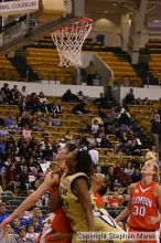 The Georgia Tech women's basketball team played Clemson.

Filename: img_0618_std.jpg
Aperture: f/2.8
Shutter Speed: 1/320
Body: Canon EOS DIGITAL REBEL
Lens: Canon EF 80-200mm f/2.8 L