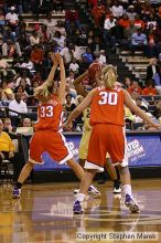 The Georgia Tech women's basketball team played Clemson.

Filename: img_0694_std.jpg
Aperture: f/2.8
Shutter Speed: 1/320
Body: Canon EOS DIGITAL REBEL
Lens: Canon EF 80-200mm f/2.8 L