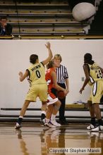 The Georgia Tech women's basketball team played Clemson.

Filename: img_0692_std.jpg
Aperture: f/2.8
Shutter Speed: 1/320
Body: Canon EOS DIGITAL REBEL
Lens: Canon EF 80-200mm f/2.8 L