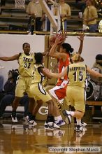 The Georgia Tech women's basketball team played Clemson.

Filename: img_0665_std.jpg
Aperture: f/2.8
Shutter Speed: 1/320
Body: Canon EOS DIGITAL REBEL
Lens: Canon EF 80-200mm f/2.8 L