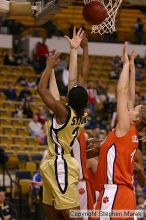 The Georgia Tech women's basketball team played Clemson.

Filename: img_0540_std.jpg
Aperture: f/2.8
Shutter Speed: 1/320
Body: Canon EOS DIGITAL REBEL
Lens: Canon EF 80-200mm f/2.8 L