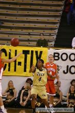 The Georgia Tech women's basketball team played Clemson.

Filename: img_0545_std.jpg
Aperture: f/2.8
Shutter Speed: 1/320
Body: Canon EOS DIGITAL REBEL
Lens: Canon EF 80-200mm f/2.8 L