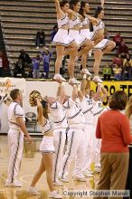 The Georgia Tech women's basketball team played Clemson.

Filename: img_0606_std.jpg
Aperture: f/2.8
Shutter Speed: 1/320
Body: Canon EOS DIGITAL REBEL
Lens: Canon EF 80-200mm f/2.8 L