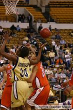 The Georgia Tech women's basketball team played Clemson.

Filename: img_0626_std.jpg
Aperture: f/2.8
Shutter Speed: 1/320
Body: Canon EOS DIGITAL REBEL
Lens: Canon EF 80-200mm f/2.8 L