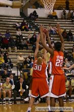 The Georgia Tech women's basketball team played Clemson.

Filename: img_0646_std.jpg
Aperture: f/2.8
Shutter Speed: 1/320
Body: Canon EOS DIGITAL REBEL
Lens: Canon EF 80-200mm f/2.8 L