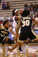 The Georgia Tech women's basketball team played Wake Forest.

Filename: IMG_1083.jpg
Aperture: f/2.8
Shutter Speed: 1/250
Body: Canon EOS DIGITAL REBEL
Lens: Canon EF 80-200mm f/2.8 L