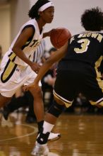 The Georgia Tech women's basketball team played Wake Forest.

Filename: IMG_1031.jpg
Aperture: f/2.8
Shutter Speed: 1/320
Body: Canon EOS DIGITAL REBEL
Lens: Canon EF 80-200mm f/2.8 L